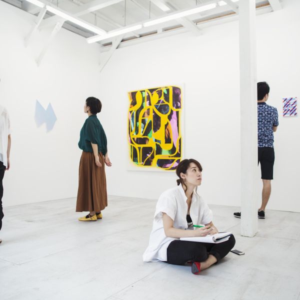 four-people-in-art-allery-looking-at-modern-pai.jpg