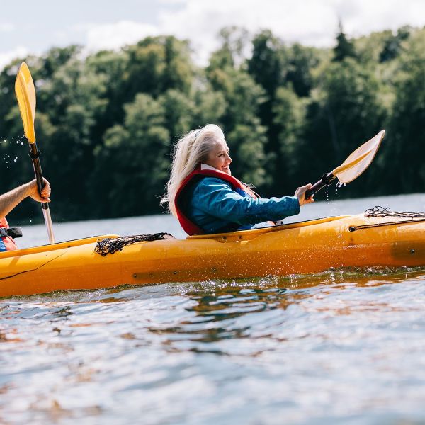 happy-senior-active-couple-kayaking-on-lake-202.jpg